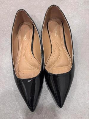 Worn ballerinas 